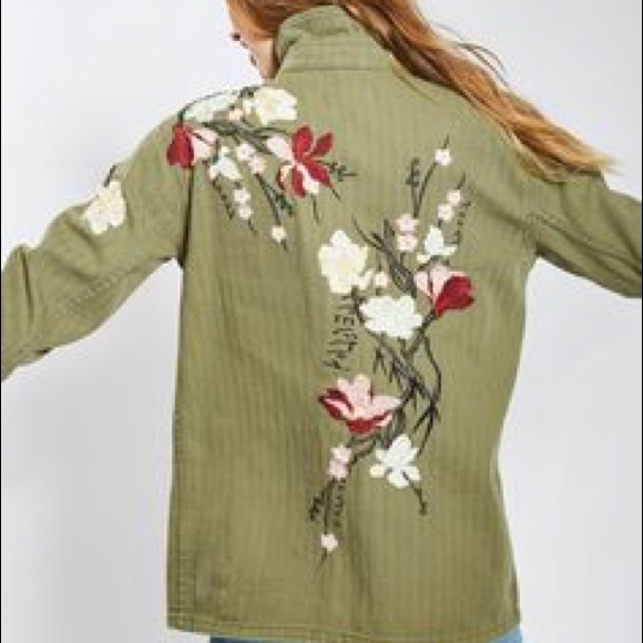 green jacket with flowers